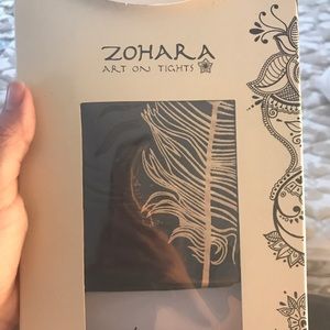 Black tights with gold feather. Super cute!